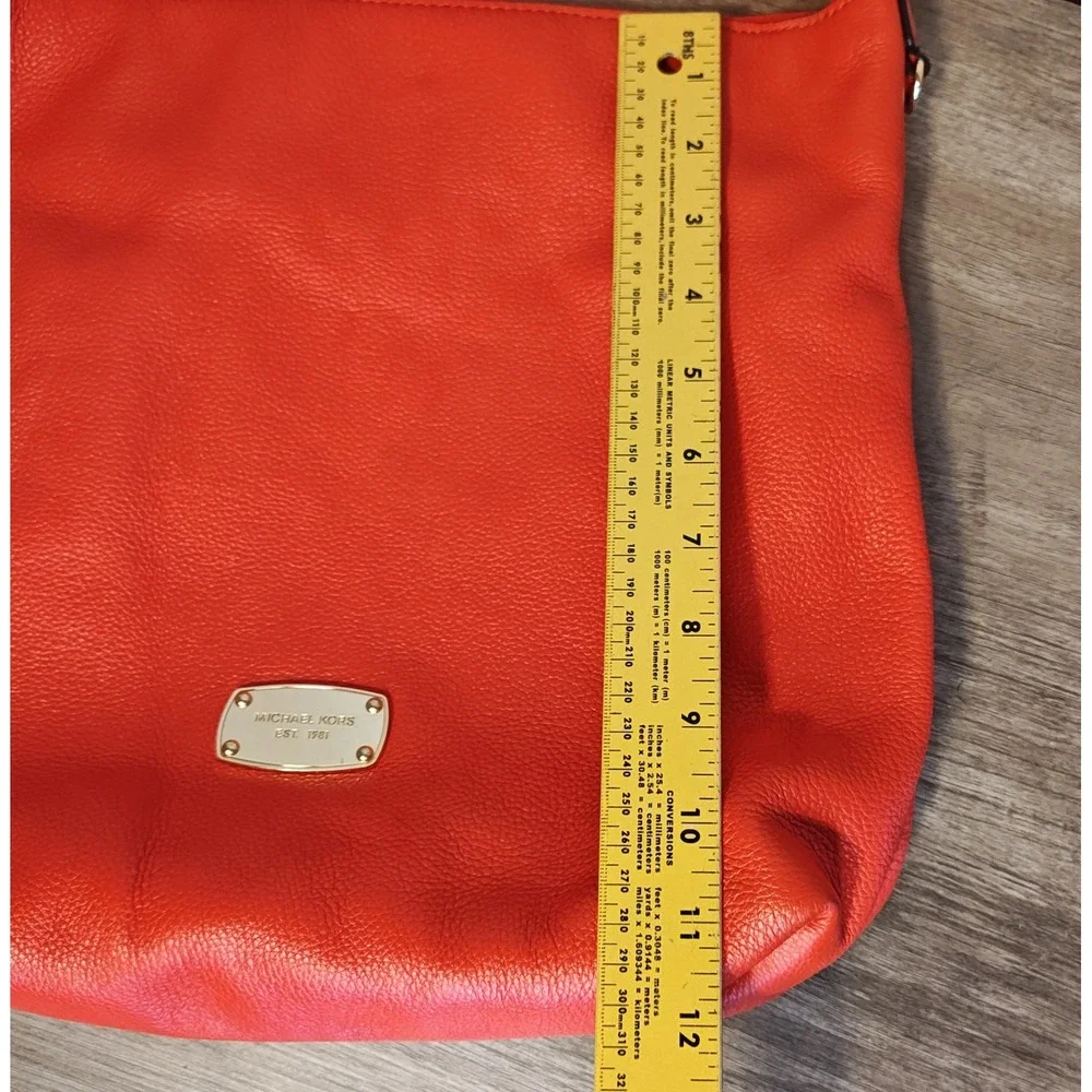 Michael Kors Hobo Crossbody Bag Womens Large Orange Pebbled Leather Tassel Gold